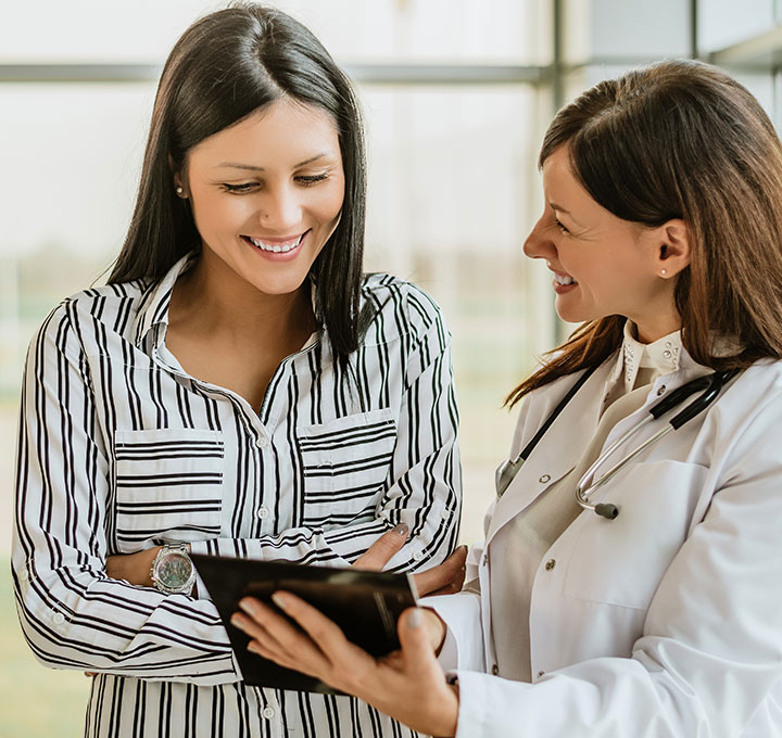 Female Patient Speaking with Doctor